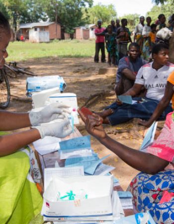 January 2015 saw a three day period of excessive rain which brought unprecedented floods to the small poor African country of Malawi. It displaced nearly quarter of a million people, devastated 64,000 hectares of land, and killed several hundred people. This shot shows A Medicin Sans Frontieres clinic in Makhanga testing local people, many of whom now have malaria, as a result of the drying up flood waters providing ideal breeding grounds for mosquitoes.